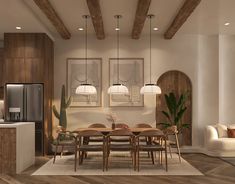 a dining room and living room combination with wood flooring, white walls and exposed beams