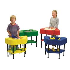 four children playing with different colored tables