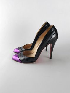 Elevate your shoe collection with these stunning Christian Louboutin Insectika heels. The elegant look that is perfect for any occasion. The layered accents, and custom repainted metallic toe on black make these shoes truly unique.  These are pre-owned, and have been repainted from a greyish tone to all black, with a metallic, purple toe, so they are 1/1! Please check all photos for the condition. They come with the original box. These shoes are EU 38.5 / UK 5.5 Please let me know if you have an Purple Toes, Womens Pumps, Womens Heels, Women's Pumps, Shoe Collection, All Black, Shoes Women Heels, Christian Louboutin, Original Box