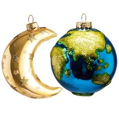 an ornament shaped like the moon and earth