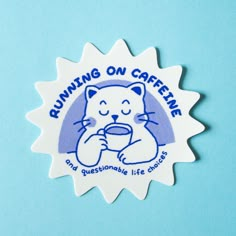 a blue and white sticker with the words running on caffeine printed on it