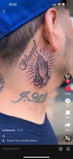 a man with a tattoo on his neck