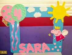 a peppa pig themed birthday party with balloons and decorations