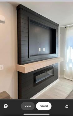 a flat screen tv mounted to the side of a wall