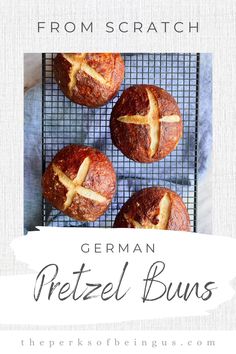 some breads on a cooling rack with the words from scratch german pretzel buns