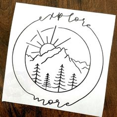 a sticker that says explore more on it with trees and mountains in the background