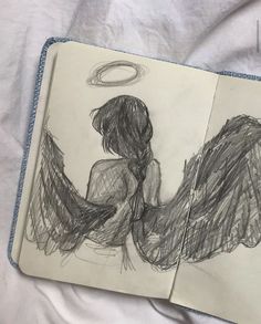 a drawing of an angel sitting on top of a bed next to a pencil sketch