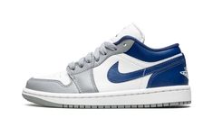 The Women’s Air Jordan 1 Low “Stealth/French Blue” is a women’s-exclusive colorway of the retro basketball shoe in a tri-color arrangement.  From Jordan Brand’s Summer 2022 release cycle, the “Stealth/French Blue” is yet another covetable look for the popular shoe.  White leather is found on the perforated toe and mid-panel.  Contrasting Stealth, or grey, leather appears on the toe cap, forefoot, and eyelets.  The collar, heel, and the Swoosh on either side of the shoe are designed in French Blu Air Jordan 1 Low Blue, Jordan 1 Low Blue, Air Jordan 1 Low White, Jordan 1 Low White, Nike X Travis Scott, Retro Basketball Shoes, Nike Air Jordan 1 Low, Unique Sneakers, Womens Air Jordans