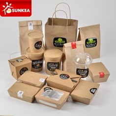 various types of coffee in brown paper bags on white background with red sticker logo