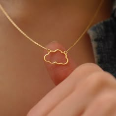 "Elevate her style with our exquisite 14K Solid Gold Cloud Necklace.  Crafted from solid 14K gold, this pendant necklace not only showcases its timeless beauty but also ensures its durability, making it a lasting symbol of your love and affection. Let her carry a piece of the sky with her wherever she goes with this dainty cloud necklace in gold. PRODUCT DETAILS * Material: 925 Sterling Silver, 14K Solid Gold (real solid gold, no gold-filled or no gold plated material)  * Choice of Gold Color: Yellow Gold, Rose Gold, White Gold  * Adjustable length  * Charm Length: 15mm, 10mm  * Closure: Spring ring  * Chain style: Cable  * Style: Minimalist Thinking of gifting? Elevate your order with our Christmas Gift Wrap option! 🎁 Buy from here! https://www.etsy.com/listing/1580219719/ M O R E F R O Unique Necklaces Silver, Yellow Gold Clavicle Chain Necklace For Birthday, Location Names, Cloud Jewelry, Cloud Necklace, Cloud Pendant, Dainty Necklaces, Pretty Jewelry Necklaces, Celestial Necklace