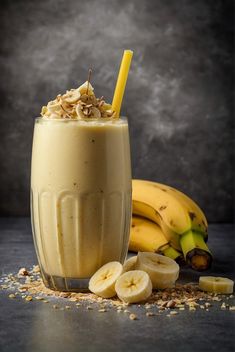 a smoothie in a glass with bananas and nuts