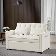 a living room with a white couch and wooden wall paneling on the side walk