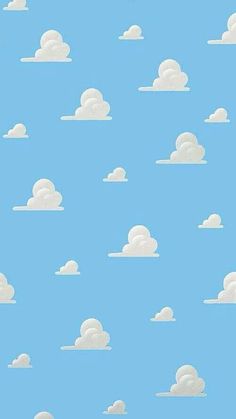 the sky is filled with white clouds on a blue background