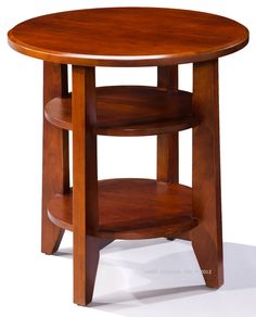 a round wooden table with two shelves on the bottom and one shelf at the top