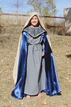 Complete King or Wise Men costume! This listing includes the grey tunic and black leather tie, the Royal Blue satin cape with gold elastic ties, the jeweled collar, and the headwrap with gold trim and gold head tie. the pictures turned out pretty good on this one and it will fit sizes 6-8 Possibly a short 10. please let me know if there are any questions! Wise Men Costume, Wisemen Costume, Wise Man Costume, Biblical Costumes, Nativity Costumes, Boys Costumes, Men Costume, King Costume, Jeweled Collar