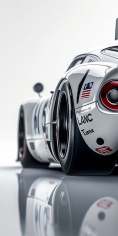 a white race car is shown in this image