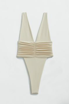 Our best-selling one-piece swimsuit in brand new shades! Equal parts sophisticated and sexy, the Echo One-Piece hugs your body and highlights your hips with a high-legged cut and minimal back coverage. The ruched side detail is met by moderate bust coverage and supportive shoulder straps. Super soft and super stretchy, this one-piece doubles as a bodysuit for an effortless beach-to-bar look. Just like an echo, you will want to repeat this purchase in every shade. Product description Minimal cove Cheap White Fun Swimwear, Cut Out Bathing Suits, Neutral Swimwear, Cabo Aesthetic, Bridal Swimsuit, Cute One Piece Bathing Suits, Sophisticated Swimwear, Vacation Swimsuit, Christmas Cruise