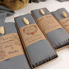 four folded wedding guest book with tags on them