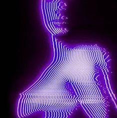 an abstract image of a man's torso in purple light