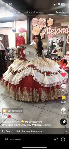 a woman in a red and white dress is looking at the camera