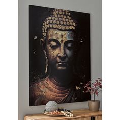 a buddha painting on the wall above a dresser