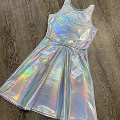 Opal Holographic A-line Mini Rave Dress w/Pockets – Peridot Clothing #ravedress #holographic #festivalclothing #holoclothing #holodress #holographicdress #festivaldress #holographicclothing #raveoutfit #festivaloutfit Holographic Dress, Holographic Fashion, Hipster Baby Clothes, Rave Dress, Dress For Kids, Trendy Baby Clothes, 90s Dress, Festival Dress, Rave Outfits