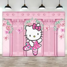 a pink hello kitty wall mural in an empty room with flowers and butterflies on the walls