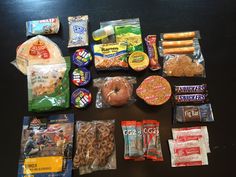 an assortment of snacks laid out on a table