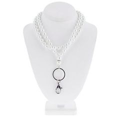 Dimensions:   Necklace:         Length: 18 1/2" (21 1/4" Including Key Ring & Lobster Clasp)       Bead Thickness: 10mm         Lobster Clasp:         Width: 9/16" (14.5mm) Keep your keys, ID badge, or special key chains on your person using this lovely, White Pearl Lanyard. This elegant lanyard features knotted faux pearl beads in bright white color with lots of shine in the light. The bottom of the lanyard has a rhinestone spacer bead for added bling and is completed with a key ring and large Pearl Lanyard, Lanyard Knot, Your Person, Jewelry Accessories Ideas, Print Coupons, Fabric Bolts, Bead Jewelry, Stylish Jewelry, Id Badge