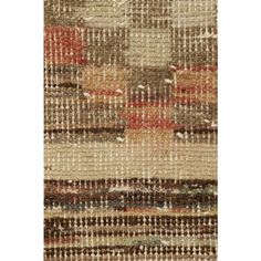 an area rug with many different colors and patterns on it, including brown, red, beige