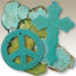 an image of a peace sign and cross cookie cutters on top of some rocks