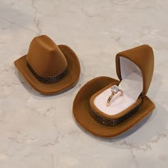 A cowboy hat ring box perfect to store a ring or small earrings Material: Velvet Flocked Ring Box Measurement Approx Length: 2.7in Width: 2.2in Height: 1.4in This listing is for 1 cowboy hat ring box (Ring in photo is for display only and not included in your order) Cowboy Hat Ring, Rhett Eaton, Summer Hamilton, Country Wedding Pictures, Country Western Wedding, Chestnut Springs, Western Themed Wedding, Gift Box Jewelry, Cowboy Wedding