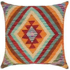 a multicolored pillow on a white background