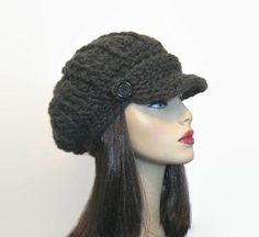 This is made to order. r. I crocheted this cap with Chunky charcoal grey yarn. It has a slight slouch. It will fit most teen or adult heads. Buttons may vary depending on availability. If you would like a different color just let me know. Some of the other colors I have are black, black tweed, brown, brown tweed, oatmeal tweed, taupe, gray tweed, light gray, dark purple and white. However, if you want a different color I can get whatever you like. Hand wash is recommended. Check out all my newsb Newsboy Hat Crochet, Gray Hat, Gray Cap, Grey Hat, Newsboy Hat, Brown Tweed, Visor Hat, Grey Tweed, Black Tweed