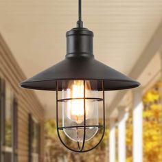 an outdoor light hanging from the ceiling