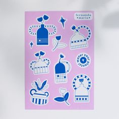 a pink sticker sheet with blue and white designs on it