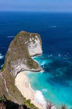 an aerial view of the beach and cliffs in nusa penida island, indonesia