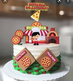 there is a birthday cake that looks like a pizza hut on the top of it