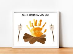 an art print with the words fall is smore fun with you and hand prints