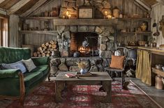 a living room filled with furniture and a fire place