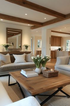 a living room filled with furniture and a wooden coffee table