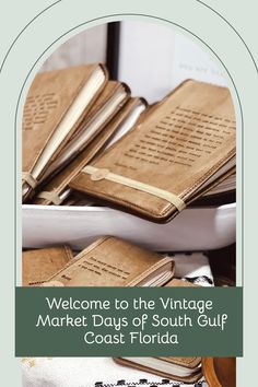 a bunch of books sitting on top of a table with the words welcome to the vintage market days of south gulf coast florida