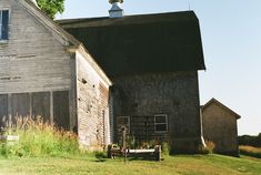 an old barn and shed in the country side