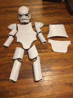 paper mache stormtrooper cut out and placed on the floor to make it look like they're ready for battle