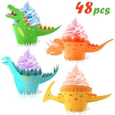 dinosaur cupcakes with frosting and sprinkles are shown in four different colors