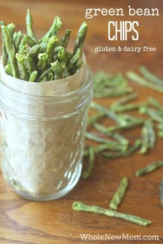 green bean chips in a mason jar on a wooden table with text overlay that reads, green bean chips gluen & dairy free