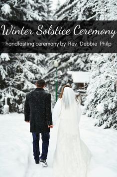 a bride and groom are walking through the snow in front of trees with text that reads winter solstic ceremony handfasting ceremony by rev, debie philip