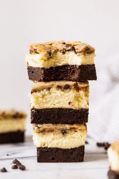 four pieces of cake sitting on top of each other