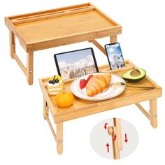 a wooden table with two trays holding food and an ipad