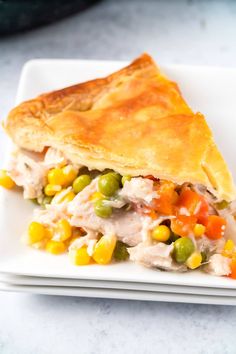 a piece of chicken pot pie on a white plate